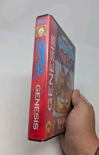 Garfield Caught in the Act (Sega Genesis) Game and Manual (Missing Comic Book) — photo 2