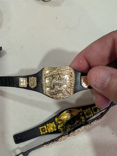 Lot of 11 WWE/WWF/ECW Action Figure Championship Belts, Used — photo 4