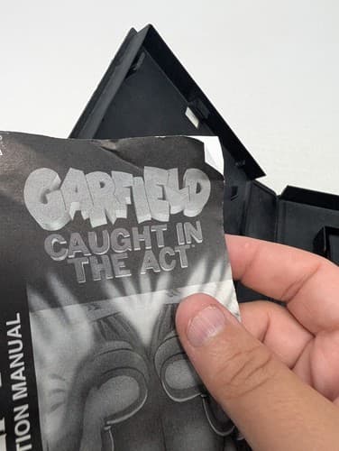 Garfield Caught in the Act (Sega Genesis) Game and Manual (Missing Comic Book) — photo 6