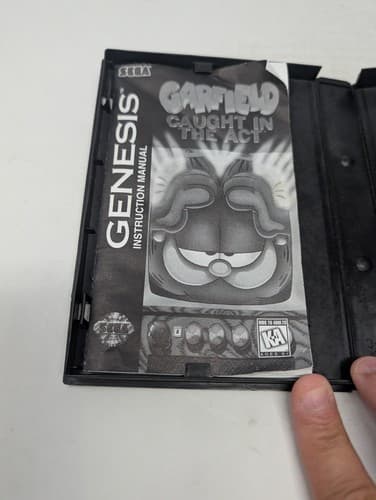 Garfield Caught in the Act (Sega Genesis) Game and Manual (Missing Comic Book) — photo 4