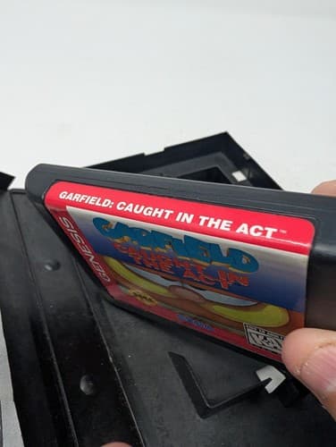Garfield Caught in the Act (Sega Genesis) Game and Manual (Missing Comic Book) — photo 9