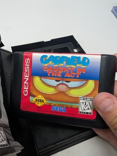 Garfield Caught in the Act (Sega Genesis) Game and Manual (Missing Comic Book) — photo 7