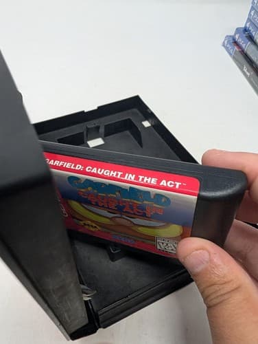 Garfield Caught in the Act (Sega Genesis) Game and Manual (Missing Comic Book) — photo 8