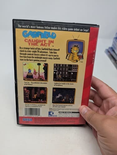 Garfield Caught in the Act (Sega Genesis) Game and Manual (Missing Comic Book) — photo 3