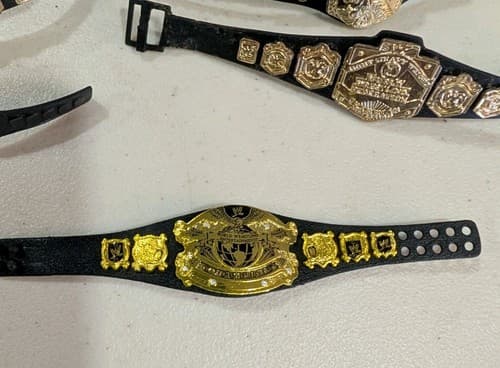 Lot of 11 WWE/WWF/ECW Action Figure Championship Belts, Used — photo 2