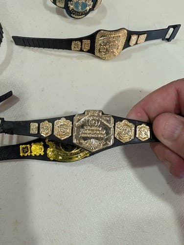 Lot of 11 WWE/WWF/ECW Action Figure Championship Belts, Used — photo 3