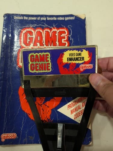 Nintendo NES Galoob Game Genie Video Game Enhancer with Code Book Manual — photo 2